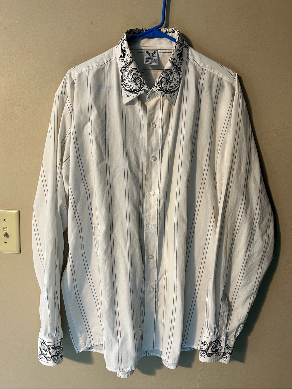 Avirex button up long sleeve cotton blend shirt with ornate collar and cuffs.